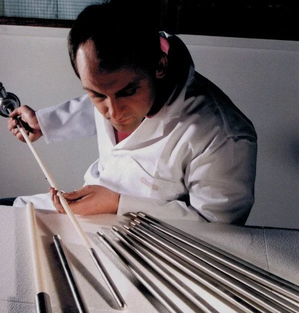 A man holding a temperature sensor